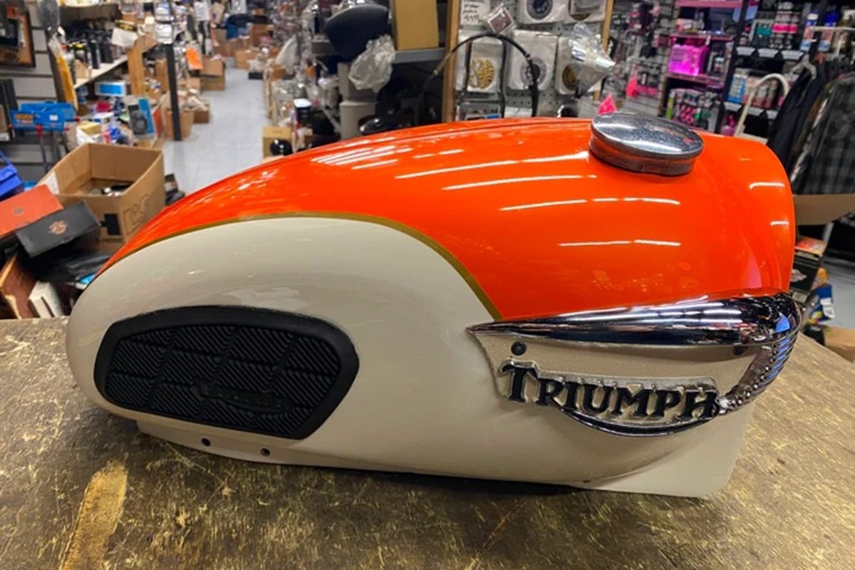 The tank of a Bonneville T120 can have more uses than one imagines